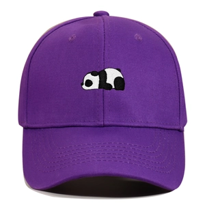 Close-up of a purple baseball cap featuring detailed black and white panda embroidery