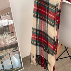 Classic red plaid Christmas tassel scarf in soft wool touch material for winter warmth