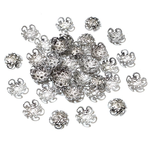 Close-up of 8mm silver hollow flower bead caps for DIY jewelry making accessories