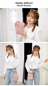 Detailed view of a pink crocodile-patterned mini crossbody bag with a round gold buckle