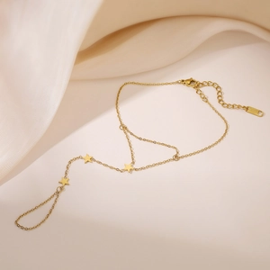 Minimalist 18K gold plated stainless steel hand chain with three star charms on silk
