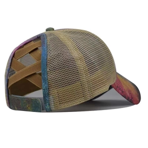 Detail view of the breathable mesh and elastic criss-cross ponytail hole on the washed cap