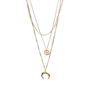 Gold layered stainless steel necklace featuring star and moon pendants on triple chains