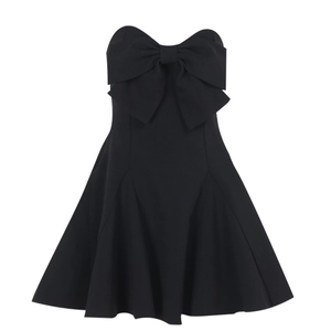 Sleeveless black mini dress featuring a large bow chest detail and sweetheart neckline
