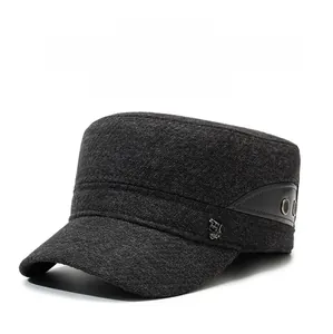 Detail view of charcoal flat top winter cap with leather patch and metal R sport logo