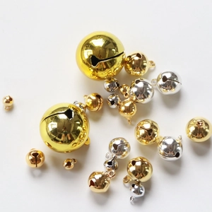 Polished gold and silver metal bells in various sizes for DIY Christmas tree ornaments