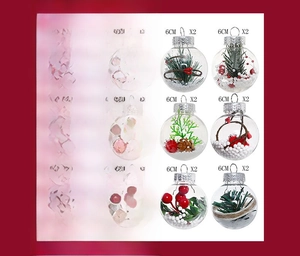 Detail view of 6cm transparent PET Christmas balls with pine needles and berries in 12-pack box