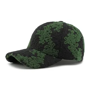 Ethnic jacquard hard top baseball cap with bouclé texture in black and green contrast