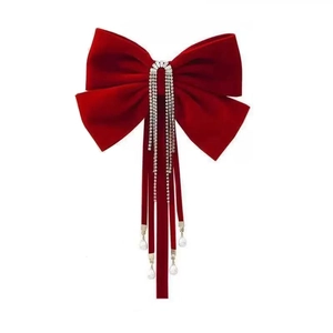 Elegant red velvet bow hair clip with crystal and pearl tassel for bridal occasions