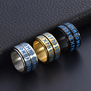 Nordic Viking spinning ring with blue glowing runes in black gold and silver finish