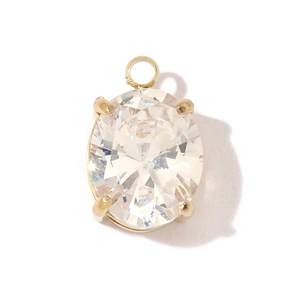 Detailed view of an oval-cut clear crystal pendant in a 4-claw gold plated setting