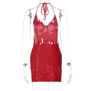Close-up of red sequin halter mini dress detailing the sparkling fabric and neckline