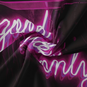Detail of bohemian tapestry fabric with Good Vibes Only text and neon gradient silk texture
