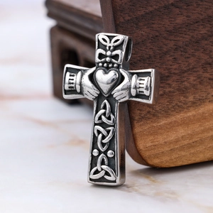 Vintage stainless steel Claddagh cross necklace with Celtic knot detailing for memorial