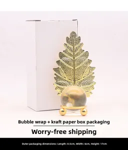 Detail of metal leaf crystal ball ornament with packaging box dimensions 8.5x6x17cm