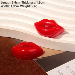 Detail of red lip resin charm showing dimensions 3.4cm length and 1.9cm width