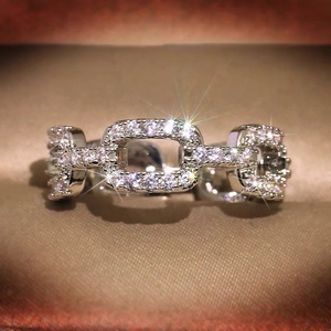 Polished silver chain link ring for women featuring micro-paved sparkling cubic zirconia