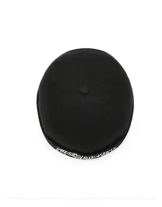 Top view of black brimless docker hat with gothic white embroidery on cotton twill fabric