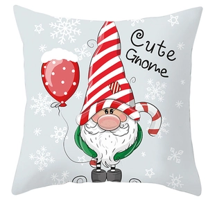 Detail of Christmas gnome pillowcase featuring a cute dwarf with a balloon and snowflakes