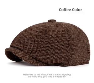 Detailed close-up showing the coffee color herringbone tweed texture of the newsboy cap