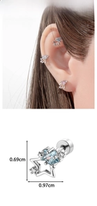 Detailed view of star-shaped titanium steel ear stud with blue zircon and size markings