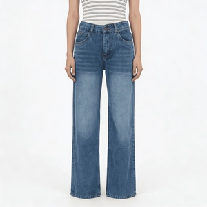 Detailed shot of dark blue high-waisted wide-leg jeans with vintage washed denim texture