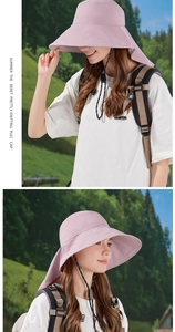 Detail view of pink sun hat with wide brim and neck flap for full outdoor protection