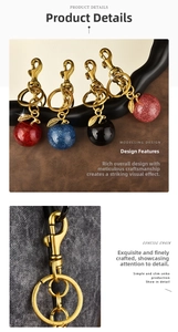Detail of apple keychain with glitter finish and gold lobster clasp in four colors
