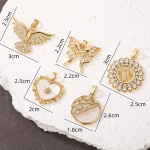 Gold plated copper pendants with zircon butterfly and sun designs and size markers