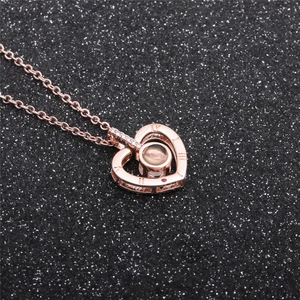Rose gold heart pendant necklace with Roman numerals and micro-inlaid zircon