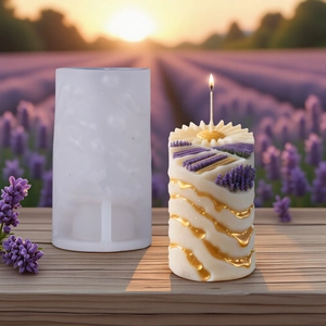 Lavender cylindrical silicone candle mold with honeycomb texture and floral relief details