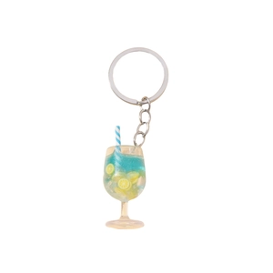 Luminous blue cocktail keychain with lemon slice and straw in a plastic goblet