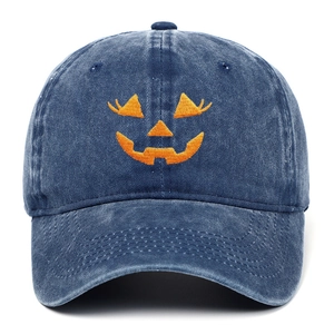 Vintage washed navy baseball cap with orange embroidered Halloween pumpkin face