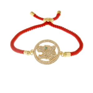 Bracelet léopard ajustable en cordon rouge avec pendentif doré serti de zircone