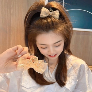 Pince à cheveux élégante en gaze champagne avec nœud et cristal pour coiffure femme