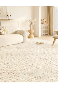 Detailed texture of waterproof cream living room rug on floor with sofa background