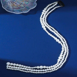 Elegant multi-layer white pearl hair chain accessory with three rows of round pearls