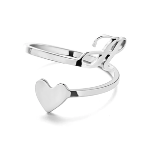 Detailed close-up of adjustable stainless steel ring with heart and letter L design
