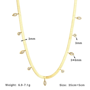 Macro detail of gold S925 snake chain showing 3mm width and zircon pendant dimensions