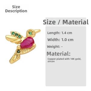 Macro view of hummingbird earrings in 18K gold plated copper with colored zircon stones