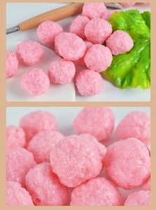 Macro detail of realistic pink food miniature fish ball model for prop decoration