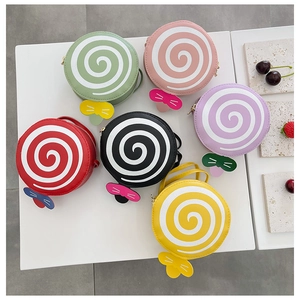 Macro view of lollipop-shaped children's crossbody bags in six vibrant colors