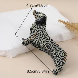 Detail view of dalmatian print dog hair claw clip with dimensions 8.5cm by 4.7cm