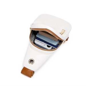 White vegan leather sling bag with internal compartments for phone and gold hardware