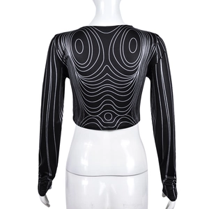 Vue arrière d'un crop top à manches longues avec motif de vagues abstrait bicolore