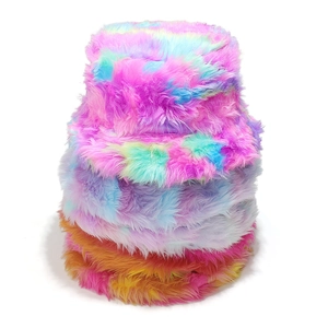 Close-up of thick plush faux fur texture on colorful tie-dye rainbow bucket hats