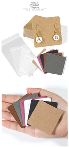Macro detail of various color jewelry display cards with clear self-sealing bags