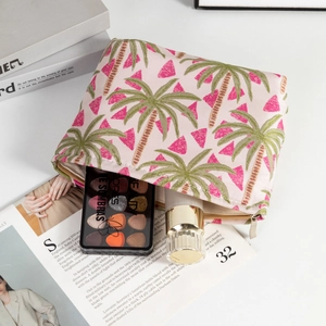 Tragbare Kosmetiktasche mit Palmenmuster aus cremeweißem Canvas und Goldreißverschluss