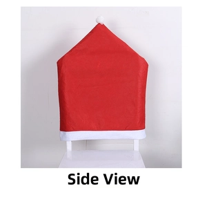 Side view detail of red non-woven Christmas hat chair cover with white plush pompom