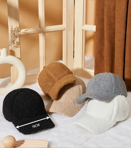 Detail shot showing 19cm brim width on warm fleece baseball caps in various winter colors